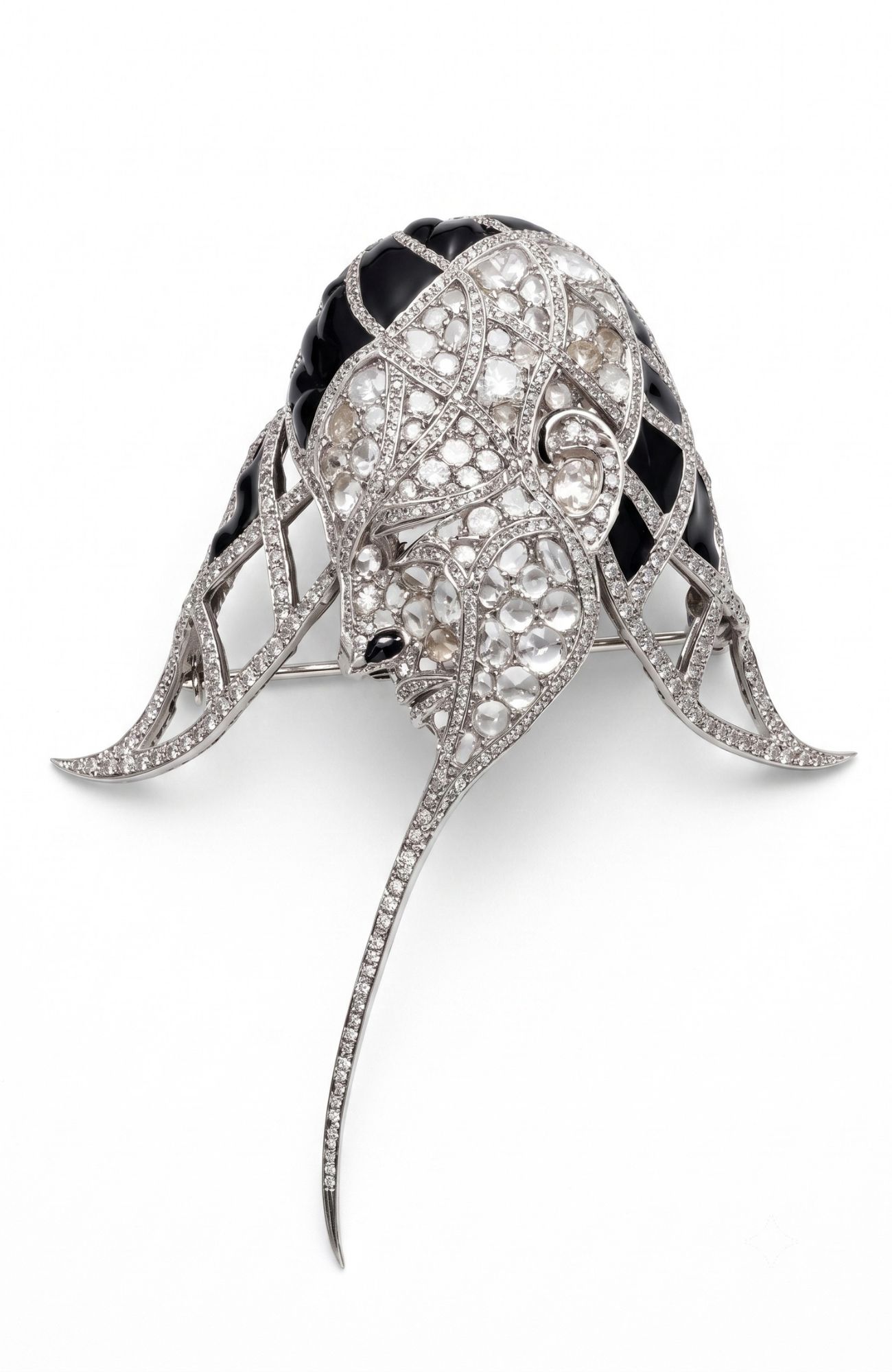 Tulip Brooch by Nilofar — a platinum stingray-form brooch pavé-set with diamonds and black enamel with a long trailing tail, a collector piece